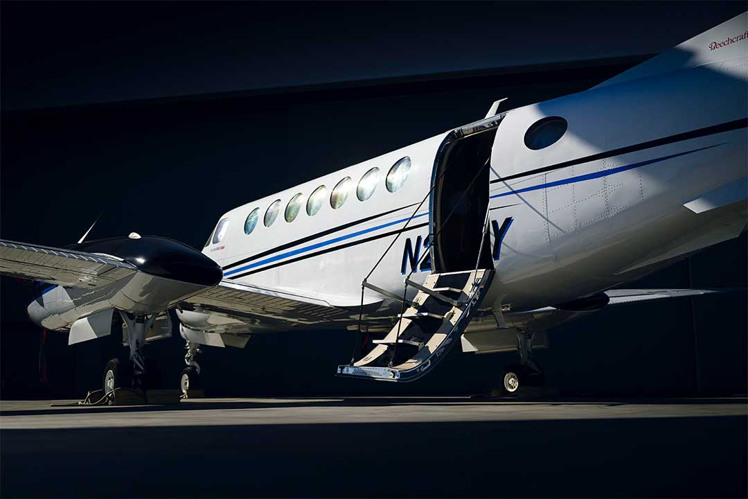 Trusted aviation for individuals, corporate and public King Air 350 on tarmac with boarding stairs